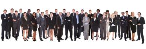 Confident business people standing against white background